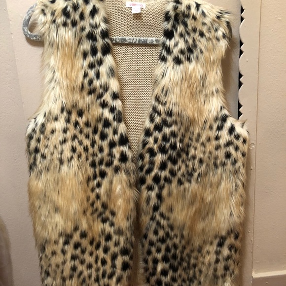 exhiliration Sweaters - Faux fur vest